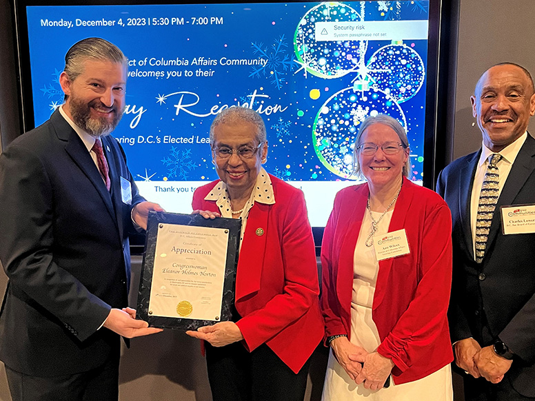 D.C. Affairs Community Steering Committee cochair Austin Ownbey, Congresswoman Eleanor Holmes Norton, D.C. Affairs Community Steering Committee cochair Ann Wilcox, and D.C. Bar President Charles R. Lowery Jr.