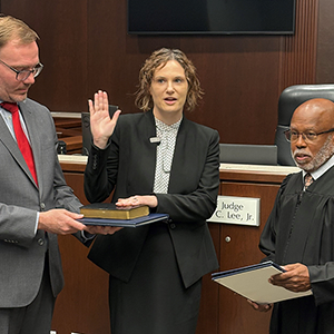 Judge Christine Macey is sworn in.