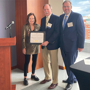 Judge Richard Linn (center) receives the Champion of Intellectual Property Award from fellow Federal Circuit Judge Kathleen M. O’Malley and D.C. Bar Intellectual Property (IP) Community Steering Committee Chair Bradley Hartman.