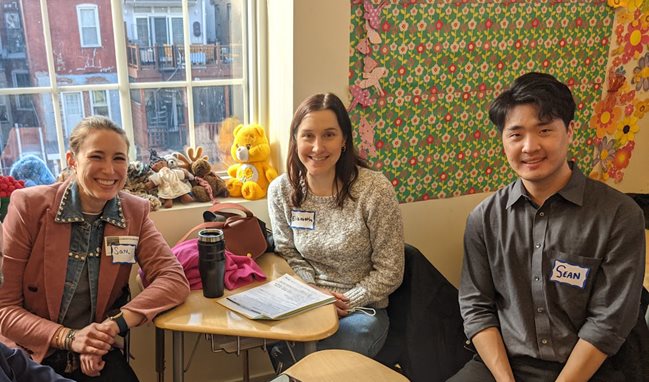 Seyfarth Shaw associates Samantha Brooks, Elizabeth Harraka, and Sean Lee volunteer at the immigration clinic.