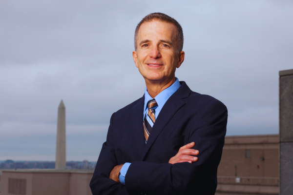 D.C. Bar CEO Bob Spagnoletti standing in front of the Washington Monument.