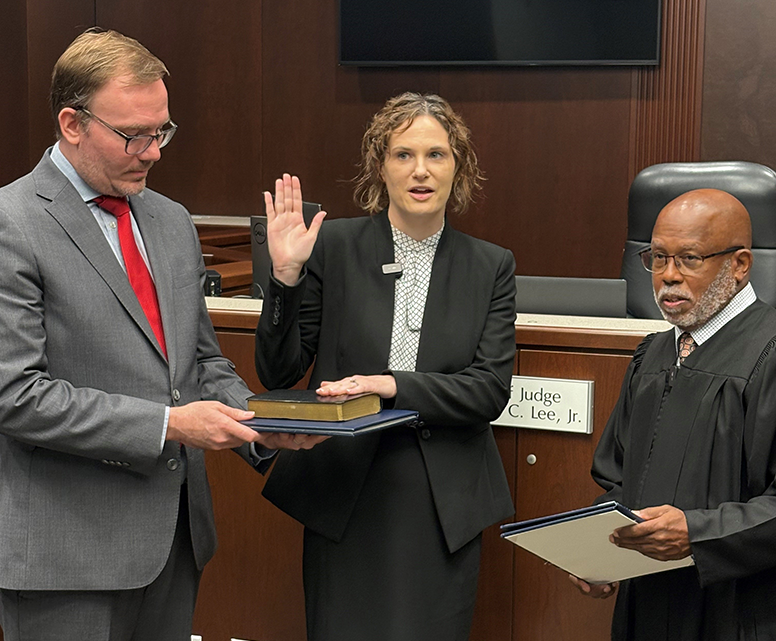Judge Christine Macey is sworn in.