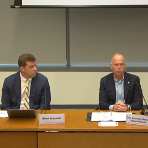 Brian Scarpelli of the Antitrust and Consumer Law Community (left) and D.C. Attorney General Brian Schwalb