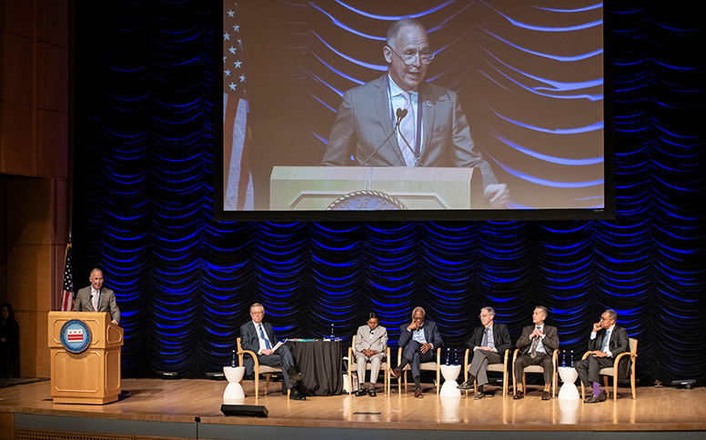 D.C. Attorney General Brian Schwalb (at podium) with (left to right) panel moderator Tom Sherwood, Judge Inez Smith Reid, Frederick D. Cooke Jr., Judge John Ferren, Robert Spagnoletti, and Karl Racine.